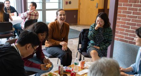UNH Law dean Megan Carpenter with students