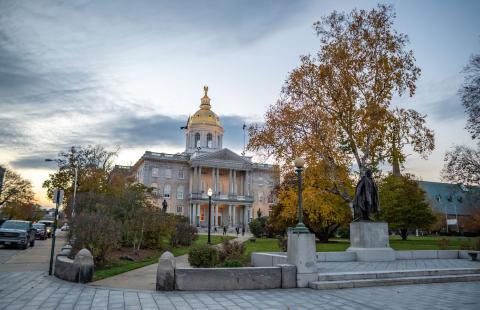 The New Hampshire State House at sunset in autumn