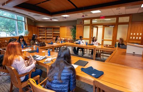 Graduate students in the Wood Boardroom