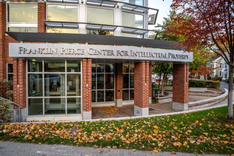 Front of the IP Center with fall leaves on ground