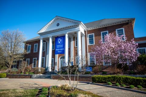 Front lawn in Spring 2021 with welcome banner