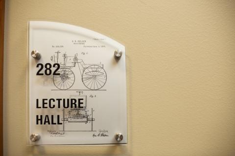 door sign outside lecture hall