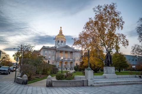 The New Hampshire State House at sunset in autumn
